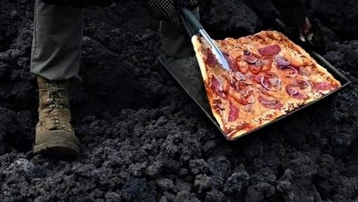 У Гватемалі чоловік готує піцу на розпеченій лаві діючого вулкану: захопливі відео